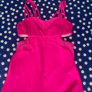 Lululemon size 6 raspberry colored tank.